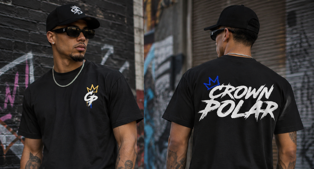 Man wearing a black t-shirt with 'Crown Polar' logo in front of a graffiti-covered wall.